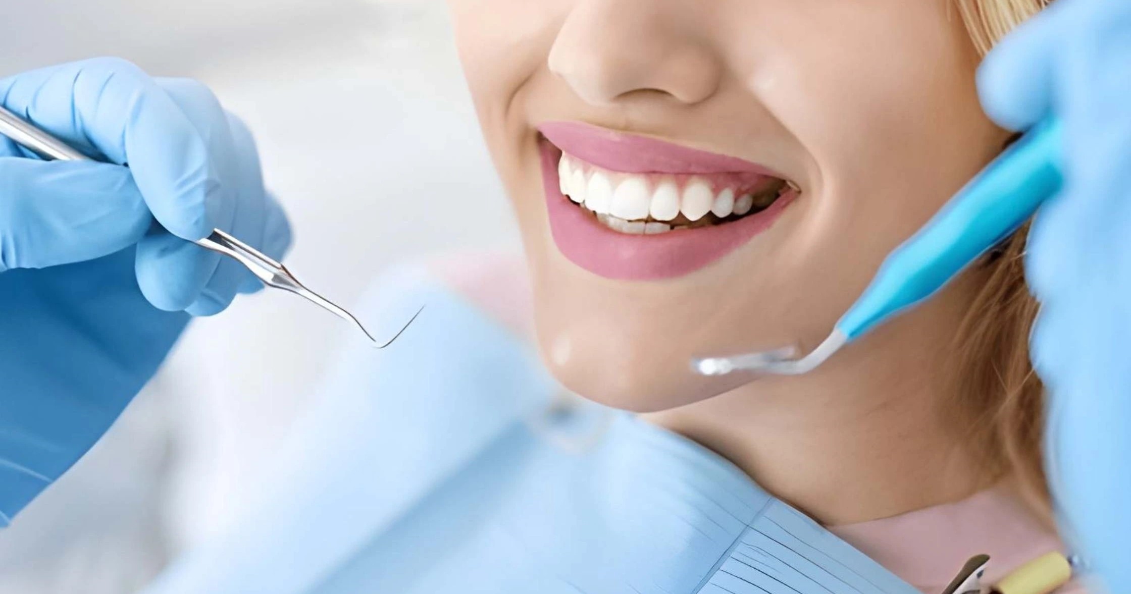 Painless root canal treatment at best dental clinic in Lucknow INDRM, 
									Patient smiling after painless dental implants in Aliganj Lucknow